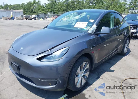 2023 Tesla Model Y Awd/Long Range Dual Motor All-Wheel Drive z USA, uszkodzony, nr VIN 7SAYGDEE3PA183786